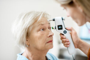 eye doctor and patient during an eye exam